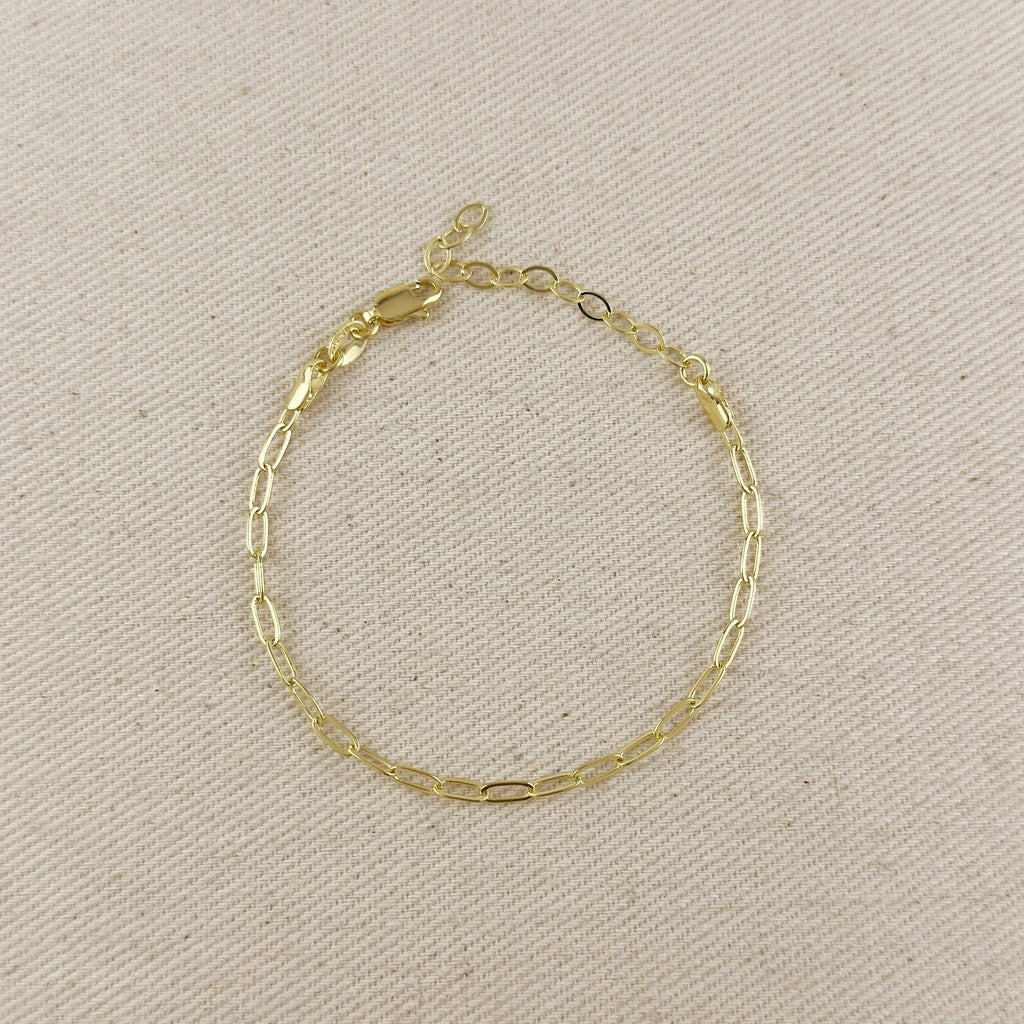 Gold filled paperclip link chain bracelet on linen