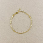 Gold filled paperclip link chain bracelet on linen