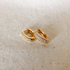 Pavé oval huggie hoops in gold filled on linen