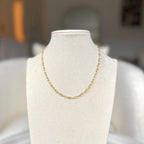 Dainty gold filled paperclip chain necklace on a linen bust