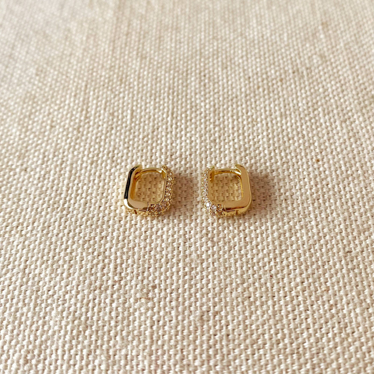 Mini rectangle pavé hoop earrings in gold filled on linen