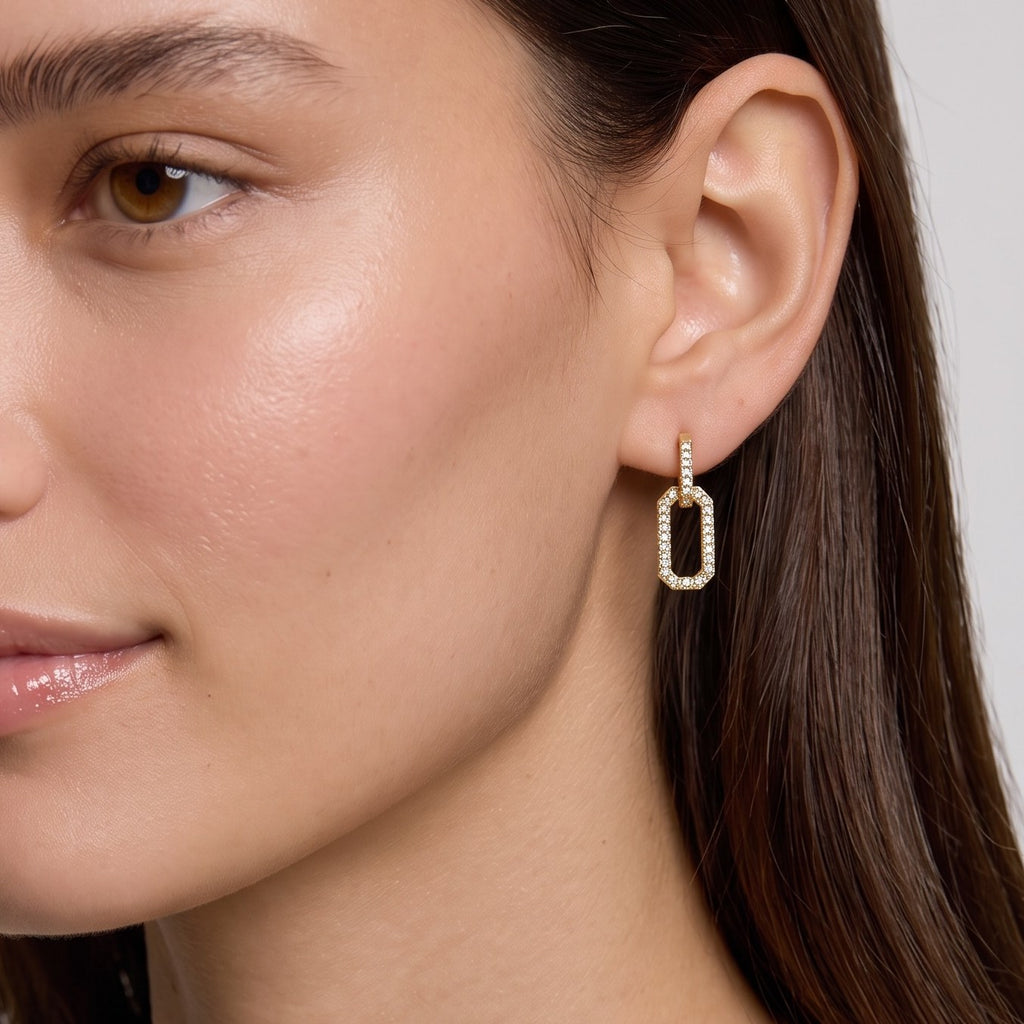 Pavé link drop earring worn on the ear