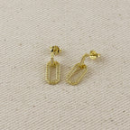 Pavé and polished link earrings on linen