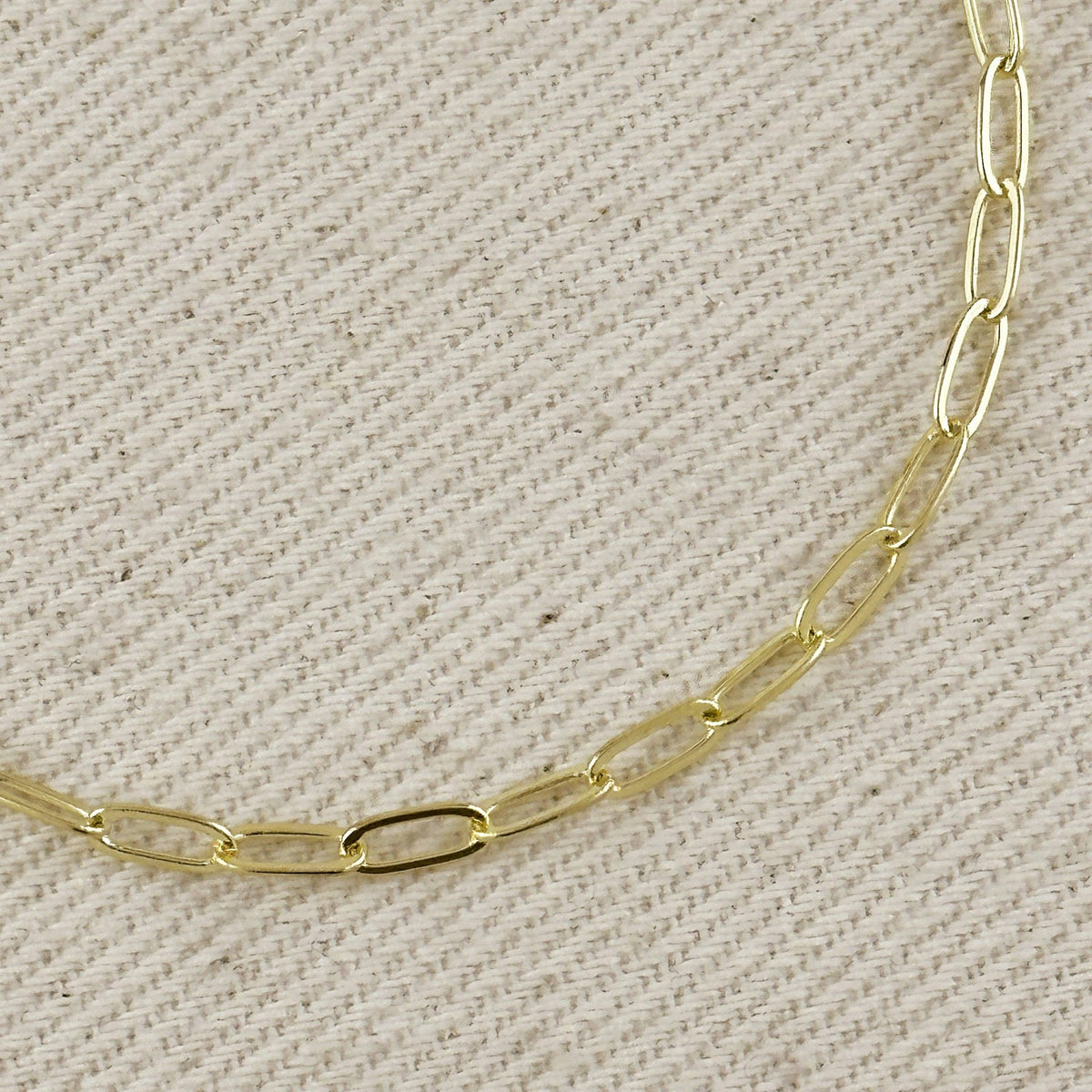 Close up of gold filled paperclip links