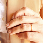 Plain gold filled ring styled on the hand