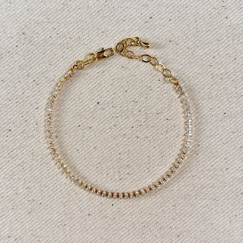 Gold filled marquise tennis bracelet with extender chain on linen