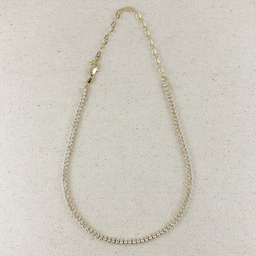 Gold filled marquise tennis necklace with extender chain on linen