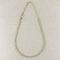 Gold filled marquise tennis necklace with extender chain on linen