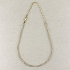 Gold filled marquise tennis necklace with extender chain on linen