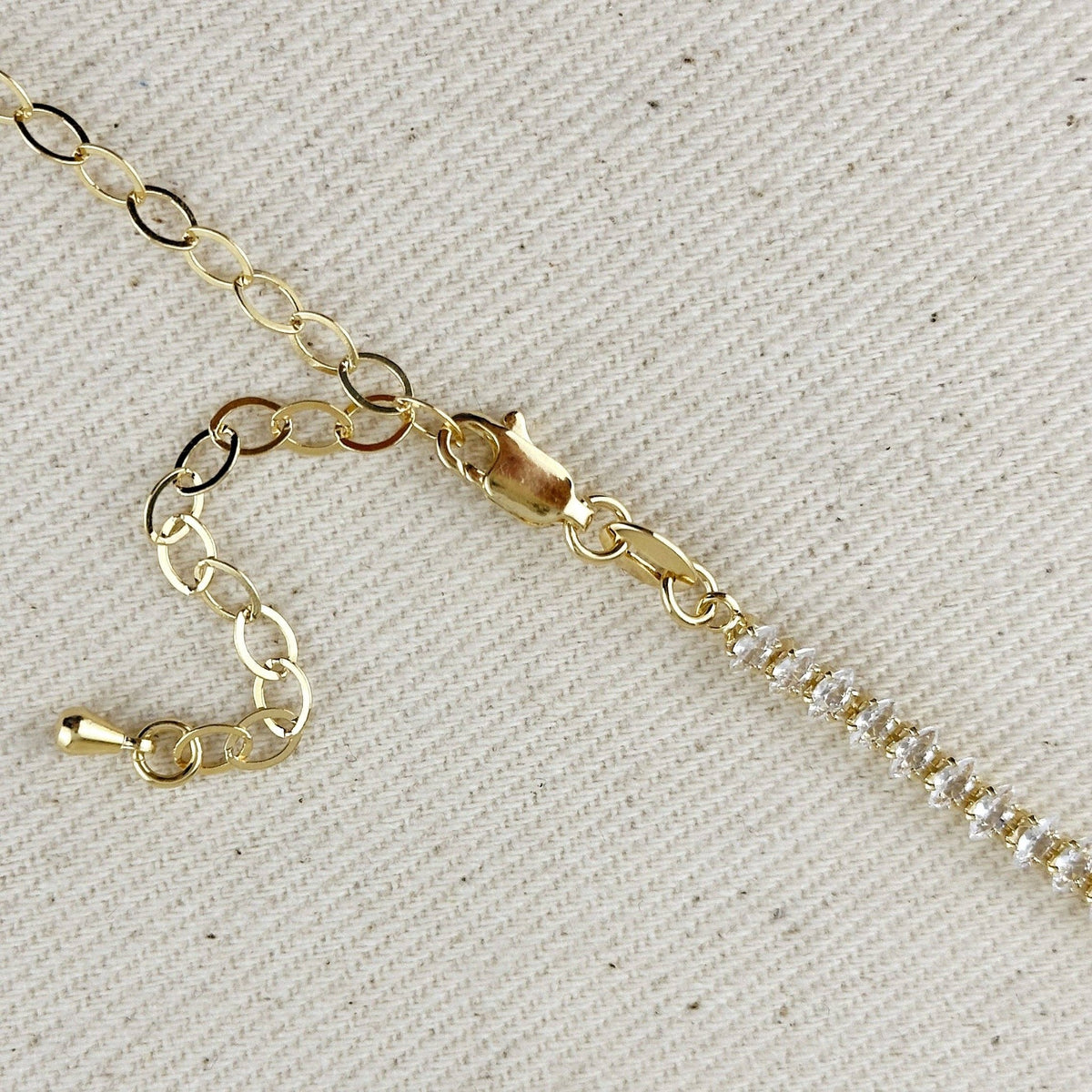 Tennis necklace lobster clasp and extender chain close up