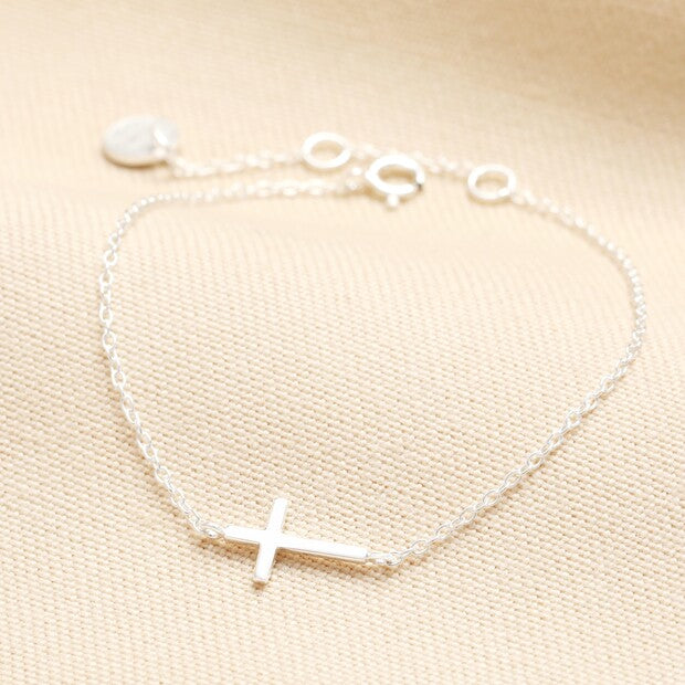 Sterling silver sideways cross bracelet on a fine cable chain
